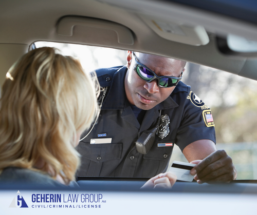 a woman getting pulled over by the cops